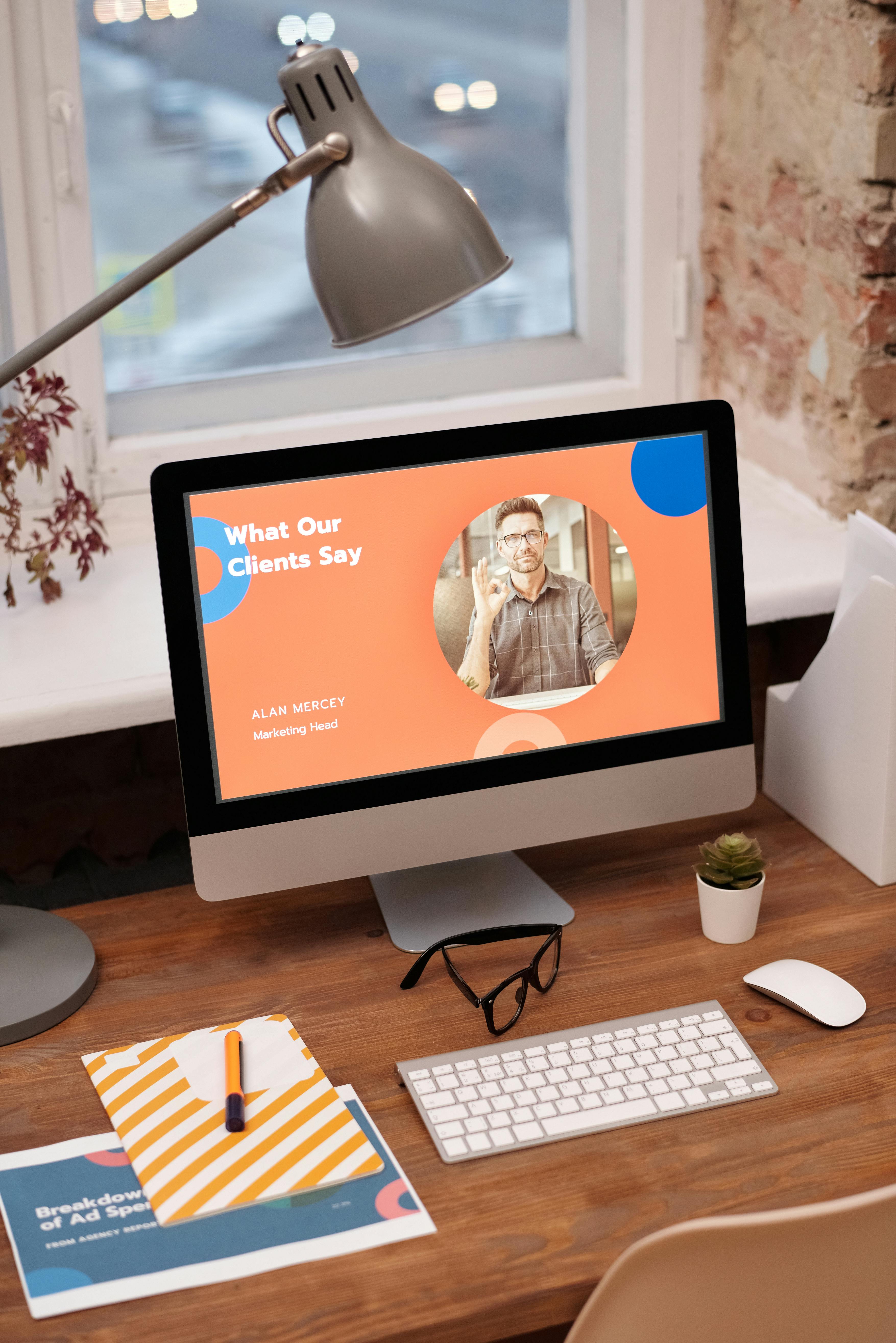 Person working at a laptop with notes and coffee